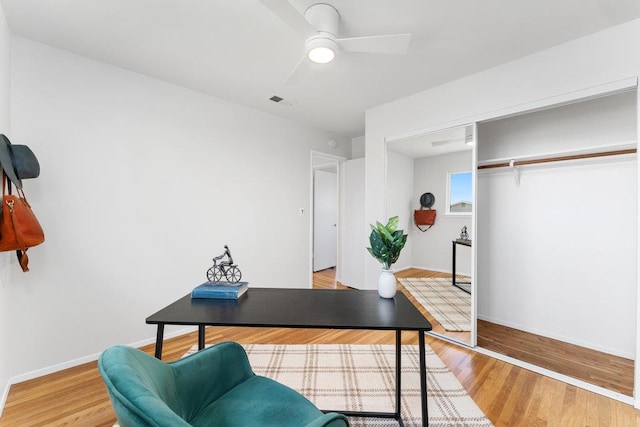 office area featuring ceiling fan and light hardwood / wood-style floors