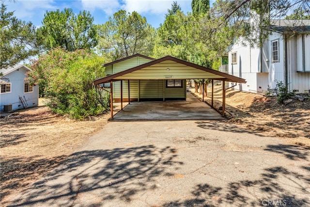 view of front of property with a carport