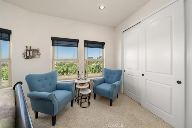 living area with a wealth of natural light and recessed lighting