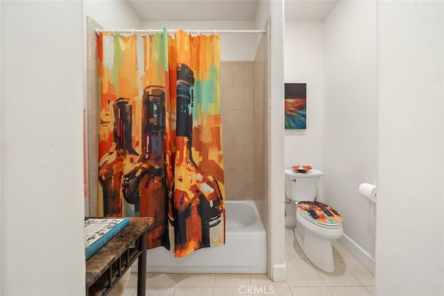 bathroom featuring tile patterned flooring, baseboards, shower / tub combo with curtain, and toilet