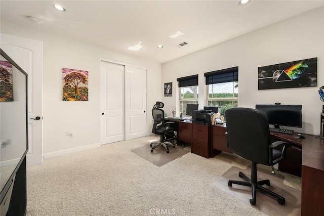 office space with baseboards, visible vents, and recessed lighting