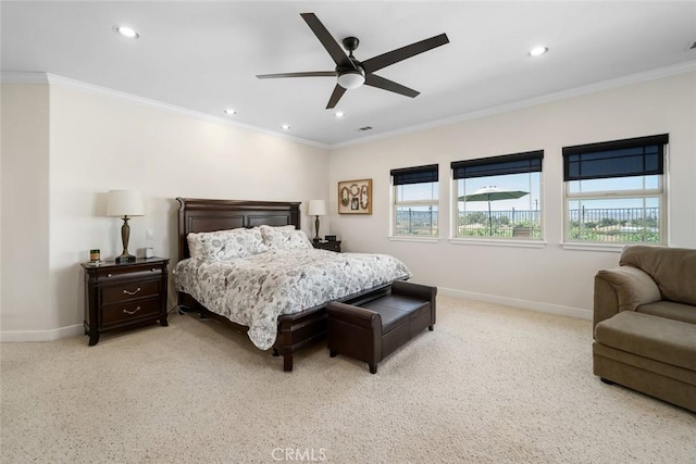 bedroom featuring baseboards, crown molding, and recessed lighting