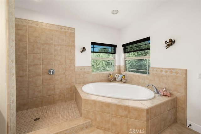 bathroom featuring a garden tub