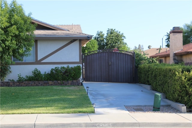 view of home's exterior with a lawn