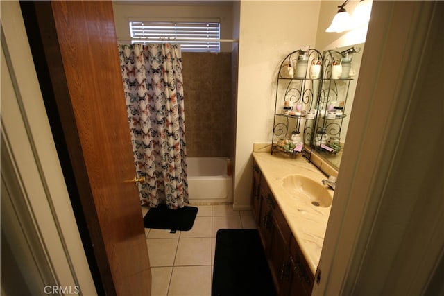 bathroom with shower / tub combo, tile patterned flooring, and vanity