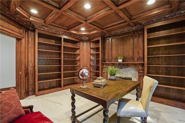 office with wood walls, ornamental molding, and coffered ceiling