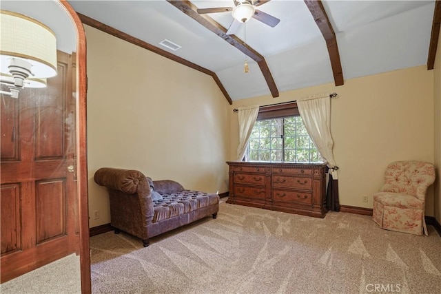 living area featuring vaulted ceiling with beams, light colored carpet, and ceiling fan