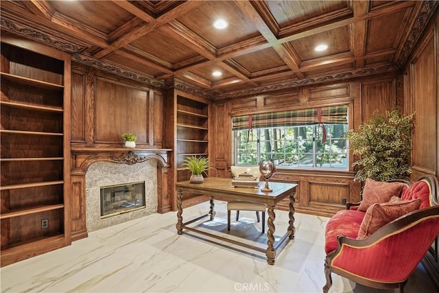 home office featuring beam ceiling, wood walls, wood ceiling, and ornamental molding