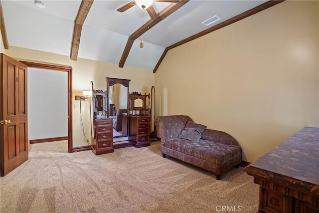 sitting room with lofted ceiling with beams, ceiling fan, and light carpet