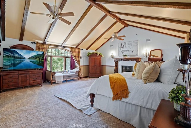 carpeted bedroom with ceiling fan and lofted ceiling with beams