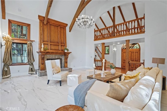 living room featuring beamed ceiling, a notable chandelier, and high vaulted ceiling