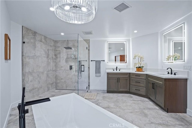 bathroom featuring shower with separate bathtub and vanity