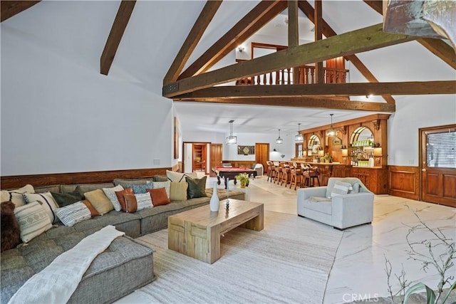 living room featuring pool table, wooden walls, beam ceiling, and high vaulted ceiling