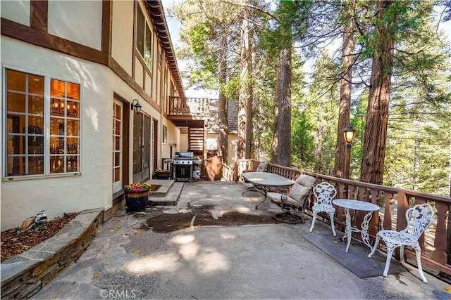 view of patio with a grill