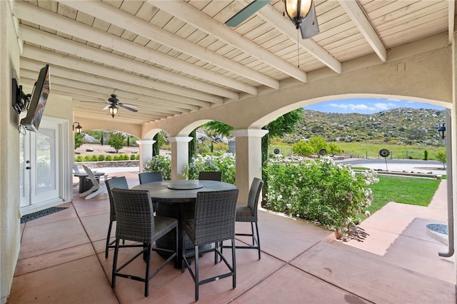 view of patio / terrace featuring ceiling fan