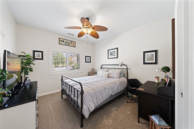 bedroom with ceiling fan and carpet