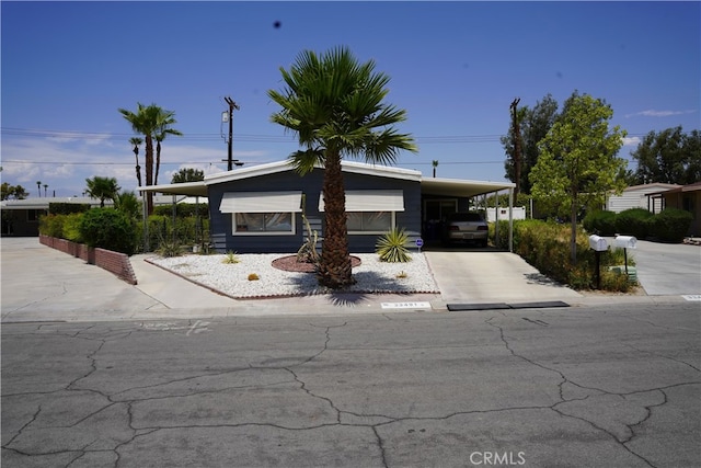 view of front of house with a carport