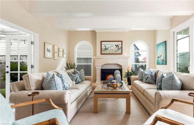 living room with beamed ceiling