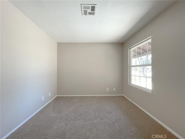 view of carpeted spare room