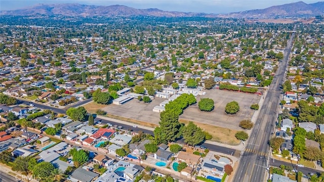 drone / aerial view featuring a mountain view