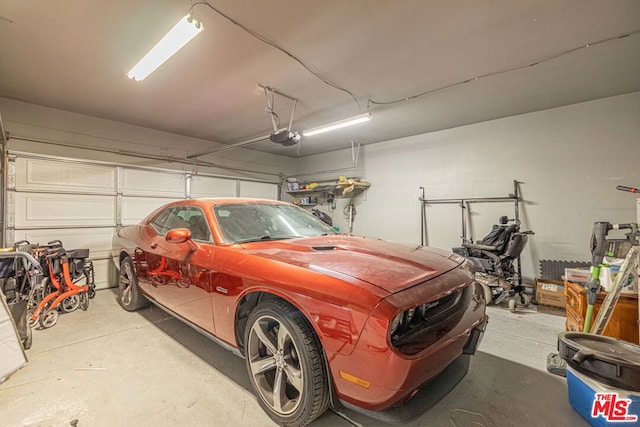 garage featuring a garage door opener