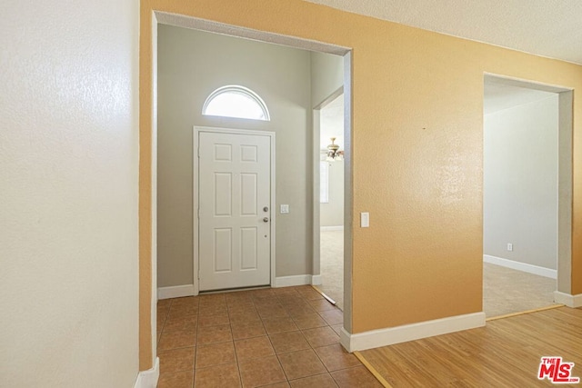 foyer with hardwood / wood-style flooring