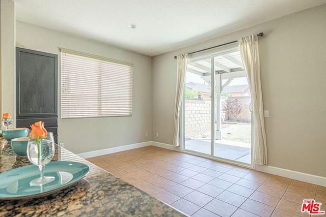 bathroom featuring tile patterned flooring