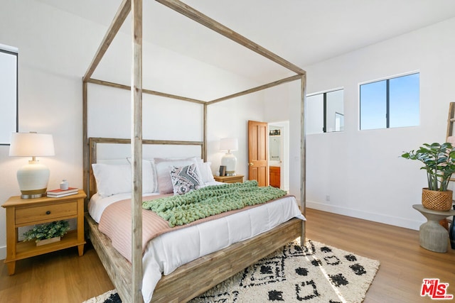 bedroom featuring light wood-type flooring