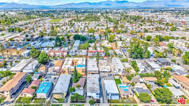 drone / aerial view featuring a mountain view