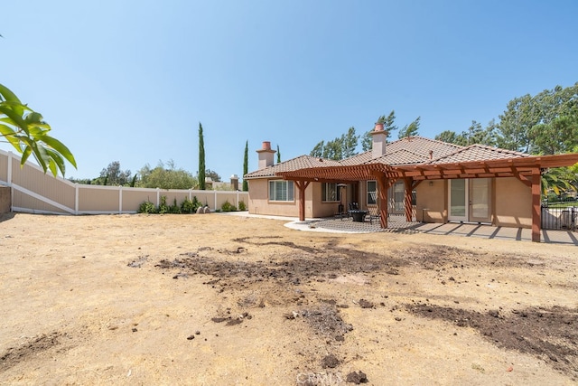 rear view of house featuring a patio area