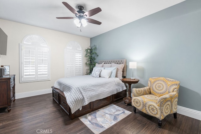 bedroom featuring dark hardwood / wood-style floors and ceiling fan