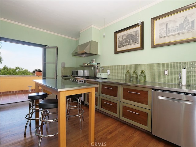 kitchen featuring dark hardwood / wood-style floors, tasteful backsplash, stainless steel counters, stainless steel appliances, and crown molding