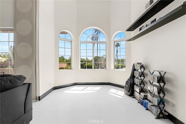 4301 Fulton Ave Unit 301, Sherman Oaks, CA 91423 - empty room with baseboards and a towering ceiling