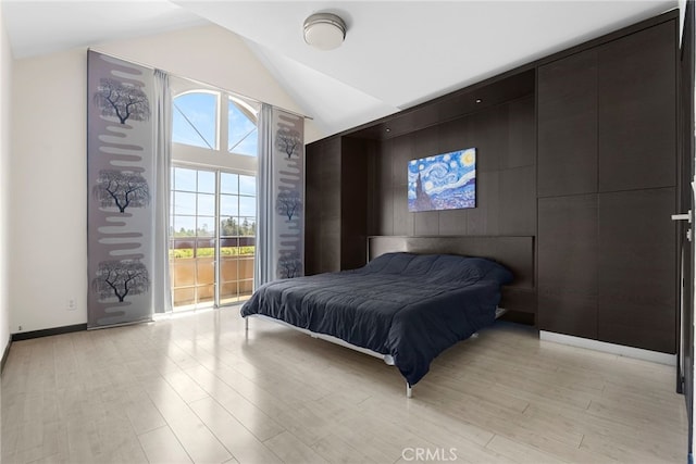 4301 Fulton Ave Unit 301, Sherman Oaks, CA 91423 - bedroom with light wood-style flooring, lofted ceiling, access to outside, and baseboards