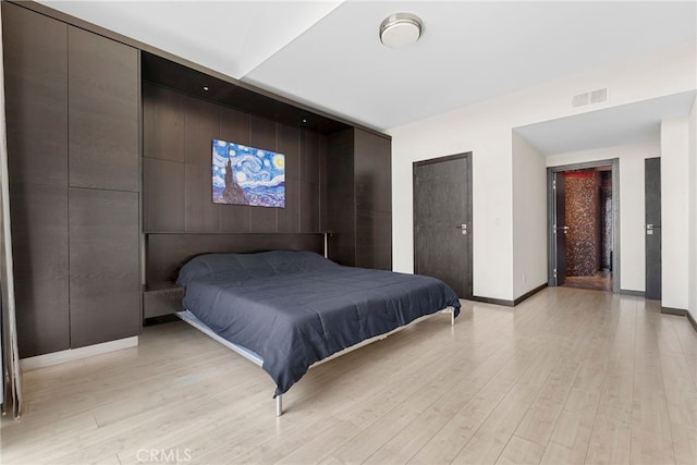4301 Fulton Ave Unit 301, Sherman Oaks, CA 91423 - bedroom featuring light wood-type flooring and baseboards