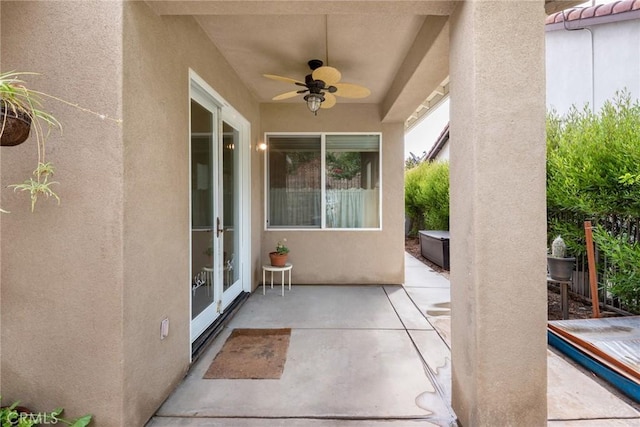 view of patio with ceiling fan and french doors