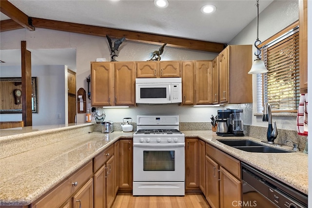 kitchen featuring sink, white appliances, decorative light fixtures, lofted ceiling with beams, and light wood-type flooring