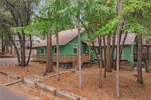 view of front of property with a deck