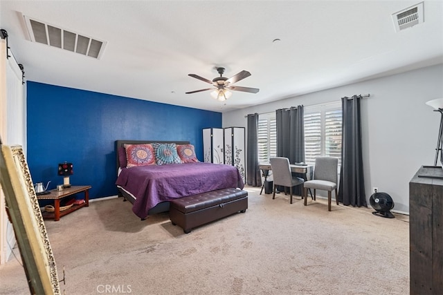 bedroom with ceiling fan and carpet