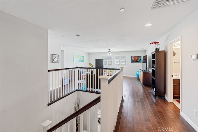 hallway with dark wood-type flooring