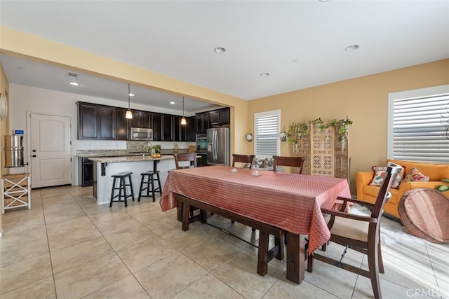 view of tiled dining space