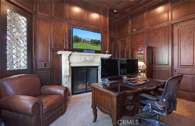 home office featuring crown molding, light colored carpet, coffered ceiling, and wood walls