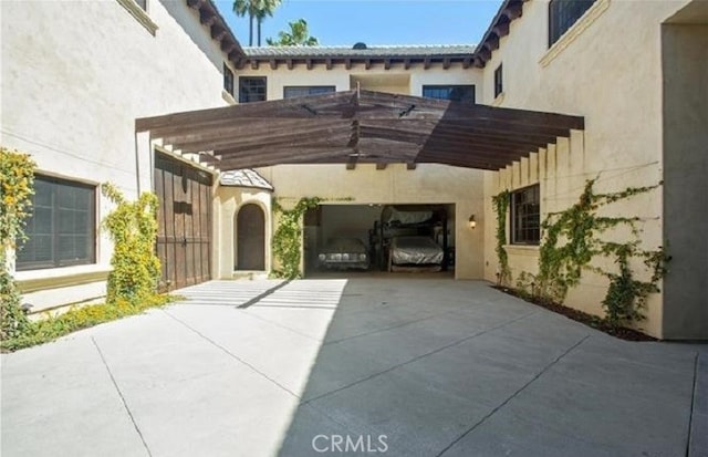 view of parking featuring a carport