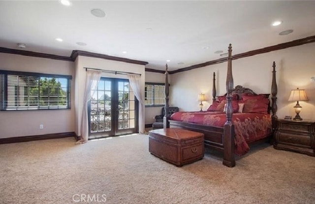 carpeted bedroom with french doors, ornamental molding, and access to exterior