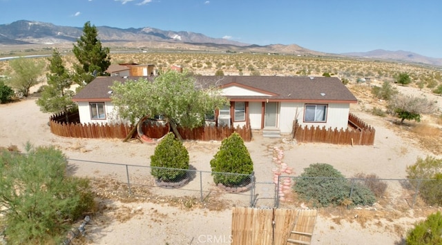 view of front of property with a mountain view