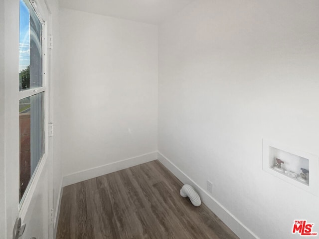 laundry area with dark hardwood / wood-style flooring and hookup for a washing machine