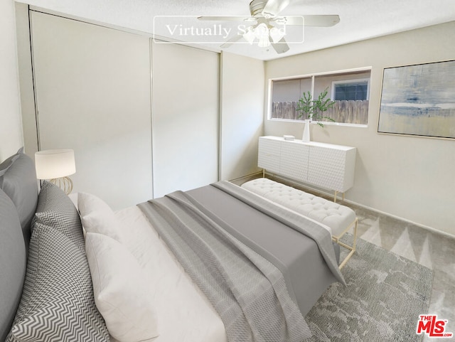 bedroom featuring carpet and ceiling fan