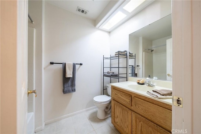 bathroom with tile patterned floors, vanity, and toilet