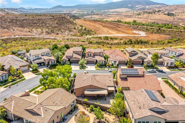 drone / aerial view featuring a mountain view