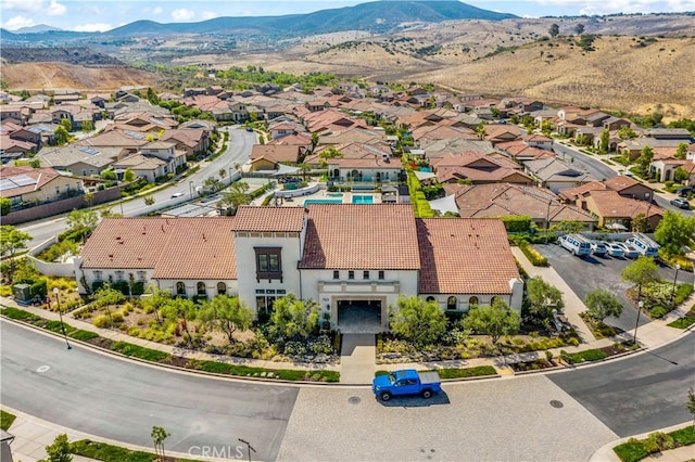 drone / aerial view featuring a mountain view